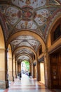 Decorated arcade on piazza Cavour in Bologna