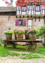 Decorated cart in the historic village of Riquewihr,Alsace. Royalty Free Stock Photo