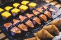 Decorated catering banquet table with different asian sushi rolls and nigiri sushi plate assortment on a party Royalty Free Stock Photo