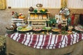 Decorated catering table in the Ukrainian rustic style with different food snacks and appetizers Royalty Free Stock Photo