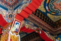 Decorated ceiling with Bhutanese art with His Majesty King Jigme Khesar Namgyel Wangchuck portrait.