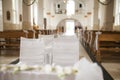 Decorated chairs inside church on marriage ceremony Royalty Free Stock Photo