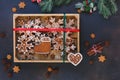 Decorated Christmas gingerbread cookies placed in wooden box Royalty Free Stock Photo