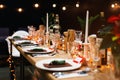 Decorated Christmas holiday table ready for dinner Royalty Free Stock Photo