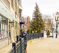 Ornamental guardrail leading to urban Christmas tree