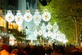 Decorated with Christmas lights Barcelona street on winter twilight