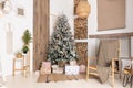 Decorated Christmas living room interior with beautiful fir tree Royalty Free Stock Photo