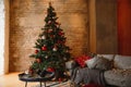 Decorated Christmas room with beautiful fir tree Royalty Free Stock Photo