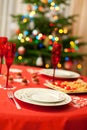 Decorated christmas table with champagne glasses Royalty Free Stock Photo