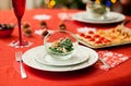 Decorated Christmas table with delicious salad Royalty Free Stock Photo