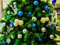 Decorated Christmas tree background, Beautiful Christmas fur-tree decorated with New Year`s toys, Christmas balls decorations on Royalty Free Stock Photo