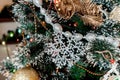 Decorated Christmas tree with balls, beads, baubles.