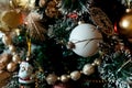 Decorated Christmas tree with balls, beads, baubles.