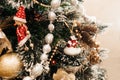 Decorated Christmas tree with balls, beads, baubles.