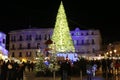 Decorated Christmas tree in a city square Royalty Free Stock Photo