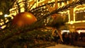 Decorated Christmas tree close-up and defocused people at traditional New Year market on the Red Square