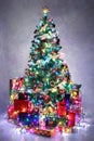 Decorated Christmas tree with colorful lights Royalty Free Stock Photo