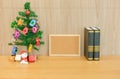 decorated christmas tree cork board & book. xmas new year holiday festival.