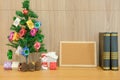 decorated christmas tree cork board & book. xmas new year holiday festival.