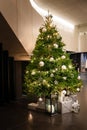 Decorated Christmas tree in a lobby. Royalty Free Stock Photo