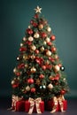 Decorated christmas tree with presents on green background. Seasons greetings Royalty Free Stock Photo