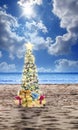 Decorated Christmas tree on sandy beach Royalty Free Stock Photo