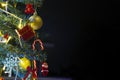 Decorated Christmas tree selective focus at red santa Royalty Free Stock Photo