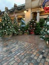 Decorated Christmas trees for sale in London`s Covent Garden. Royalty Free Stock Photo