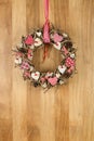 Decorated Christmas Wreath Red White Cloth Hearts on Sapele Wood Royalty Free Stock Photo