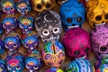 Decorated colorful skulls, ceramics death symbol at market, day of dead, Mexico Royalty Free Stock Photo