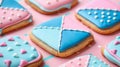 Decorated cookies in vintage quilt pattern, blue and pink icing, multi colored dough background Royalty Free Stock Photo