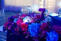 decorated in disco style table in a dark banquet hall. Royalty Free Stock Photo