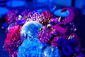 decorated in disco style table in a dark banquet hall. Royalty Free Stock Photo