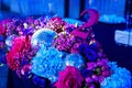 decorated in disco style table in a dark banquet hall. Royalty Free Stock Photo