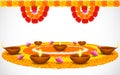 Decorated Diwali Diya on Flower Rangoli Royalty Free Stock Photo