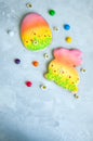 Decorated Easter Bunny and Egg Cookies Colorful Candies Camomile on a white background. Easter concept.