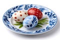 Decorated Easter eggs displaying traditional holiday patterns on a plate Royalty Free Stock Photo