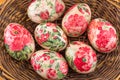 Decorated Easter eggs in a basket close up Royalty Free Stock Photo
