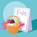 Decorated easter eggs in basket wicker with card