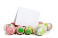 Decorated easter eggs with a blank notecard Royalty Free Stock Photo