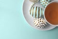 Decorated Easter eggs in a bowl, closeup on pastel background Royalty Free Stock Photo