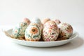 Decorated Easter Eggs with Floral Patterns on a Plate Royalty Free Stock Photo