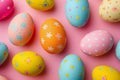 Decorated Easter eggs on pink background, top view. Flat lay composition Royalty Free Stock Photo
