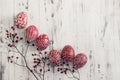 Decorated Easter eggs Pysanka on whitewashed wooden background