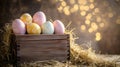 Decorated easter eggs rest inside a wooden box on hay Royalty Free Stock Photo