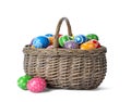 Decorated Easter eggs in wicker basket Royalty Free Stock Photo