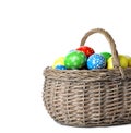 Decorated Easter eggs in wicker basket Royalty Free Stock Photo