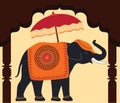 Decorated Elephant and Umbrella under arch.