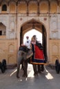 Decorated elephants waiting tourists at Amber Fort in Jaipur