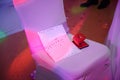 Decorated empty chairs at wedding party. Dancefloor